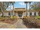 Clubhouse surrounded by lush landscaping at 30352 Elderwood Dr, Wesley Chapel, FL 33543
