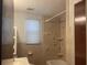 The bathroom has a tiled shower and classic fixtures at 3110 58Th N Ave, St Petersburg, FL 33714