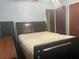 A cozy bedroom featuring a comfortable bed and classic design elements at 3110 58Th N Ave, St Petersburg, FL 33714
