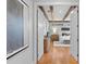 A bedroom with wood beam ceilings is seen from an entryway at 3307 W Knights Ave, Tampa, FL 33611