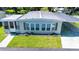 Inviting single-story home boasting a carport and manicured lawn at 37812 Valencia Ave, Zephyrhills, FL 33541