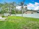 A large backyard with a white fence and lots of room for outdoor activities at 4002 Hudson Ter, Tampa, FL 33618