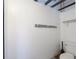 Simple bathroom with basic fixtures and white-painted wood paneled walls at 4002 Hudson Ter, Tampa, FL 33618