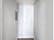 Empty hallway with neutral paint and a utility box at 4002 Hudson Ter, Tampa, FL 33618