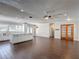 Open kitchen with white cabinetry, stainless appliances, and an island at 4002 Hudson Ter, Tampa, FL 33618