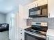 The kitchen offers modern appliances, ample counter space, and storage at 4002 Hudson Ter, Tampa, FL 33618