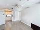 Spacious open floor plan with vaulted ceiling and white cabinets at 4002 Hudson Ter, Tampa, FL 33618