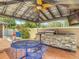 Outdoor kitchen featuring built-in grill, sink, and countertop space at 4002 Hudson Ter, Tampa, FL 33618