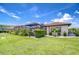 Beautiful backyard with screen enclosed pool and meticulous landscaping, perfect for relaxation at 4122 Natural Vista Ct, New Port Richey, FL 34655