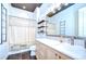 Contemporary bathroom featuring modern vanity, mosaic tile, and shower with decorative curtain at 4122 Natural Vista Ct, New Port Richey, FL 34655