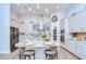 Bright kitchen with a spacious island, stainless steel appliances, and modern cabinetry, perfect for cooking and entertaining at 4122 Natural Vista Ct, New Port Richey, FL 34655