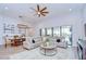 Open concept living room with a view of the backyard and patio at 4122 Natural Vista Ct, New Port Richey, FL 34655