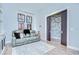 Living room featuring pocket doors that lead to a bonus space or den at 4122 Natural Vista Ct, New Port Richey, FL 34655