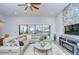 Comfortable living room with sliding doors to the outdoor living space at 4122 Natural Vista Ct, New Port Richey, FL 34655