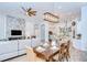 An open design flows seamlessly from the kitchen, dining area and living room at 4122 Natural Vista Ct, New Port Richey, FL 34655