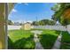 Spacious backyard featuring green grass, privacy fence and storage shed at 4242 7Th N Ave, St Petersburg, FL 33713
