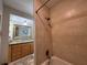 Well-lit bathroom featuring a tiled shower/bathtub combination and vanity with decorative countertop at 4242 7Th N Ave, St Petersburg, FL 33713
