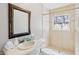 Elegant bathroom featuring a sink, toilet and a tiled shower-tub combo at 4242 7Th N Ave, St Petersburg, FL 33713