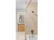 Well-lit bathroom featuring a shower, neutral wall tile and modern fixtures at 4242 7Th N Ave, St Petersburg, FL 33713
