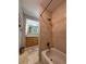 Well-lit bathroom featuring a tiled shower/bathtub combination and vanity with decorative countertop at 4242 7Th N Ave, St Petersburg, FL 33713