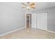 Bedroom with ceramic tile flooring, natural light, and closet space at 4242 7Th N Ave, St Petersburg, FL 33713