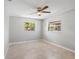 Bedroom with ceramic tile flooring and a modern ceiling fan at 4242 7Th N Ave, St Petersburg, FL 33713