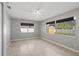 Spacious bedroom featuring ceramic tile floors and a modern ceiling fan at 4242 7Th N Ave, St Petersburg, FL 33713