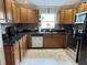 Kitchen with stainless steel appliances, ample counter space, and wooden cabinetry at 4242 7Th N Ave, St Petersburg, FL 33713