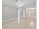 Open-concept living room boasts light tile flooring and abundant space at 4242 7Th N Ave, St Petersburg, FL 33713