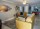 Spacious living room featuring comfortable seating, stylish decor, and a large decorative rug at 4242 7Th N Ave, St Petersburg, FL 33713