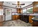 Functional laundry area with modern appliances, ample counter space, and natural light from the window at 4313 Riviera Ct, Spring Hill, FL 34608