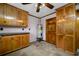 Well-organized laundry room with a convenient layout, storage cabinets, and updated appliances at 4313 Riviera Ct, Spring Hill, FL 34608