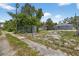 Large, fenced backyard showing the property's boundaries and surrounding greenery at 4535 15Th S Ave, St Petersburg, FL 33711