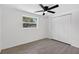 Bright bedroom with closet, window, and tile floor; providing ample space at 4535 15Th S Ave, St Petersburg, FL 33711