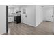 Cozy kitchen featuring white cabinets, stainless steel appliances, and tile flooring at 4535 15Th S Ave, St Petersburg, FL 33711
