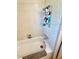 A clean bathtub with shower fixture and toiletries; the space is functional at 5215 76Th N N St, St Petersburg, FL 33709