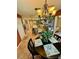 Cozy dining area with stylish lighting and a view into the kitchen at 5215 76Th N N St, St Petersburg, FL 33709