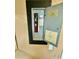 Open electrical panel with visible breakers and safety information at 5215 76Th N N St, St Petersburg, FL 33709