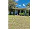 Charming single-story home with well-manicured greenery and a cozy front entrance at 5215 76Th N N St, St Petersburg, FL 33709