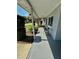 Welcoming covered front porch with seating, perfect for enjoying the outdoors at 5215 76Th N N St, St Petersburg, FL 33709