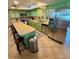Well-equipped kitchen with ample counter space and modern stainless steel refrigerator at 5215 76Th N N St, St Petersburg, FL 33709