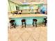 Spacious kitchen island with seating, perfect for casual dining and entertaining at 5215 76Th N N St, St Petersburg, FL 33709