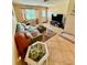 Comfortable living room with neutral tones and a cozy seating area at 5215 76Th N N St, St Petersburg, FL 33709
