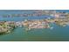 Scenic aerial view of waterfront neighborhood featuring beautiful homes, docks, and water access at 5950 Bikini N Way, St Pete Beach, FL 33706
