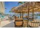 Waterfront tiki bar offering a relaxing spot for entertaining and enjoying the waterfront lifestyle at 5950 Bikini N Way, St Pete Beach, FL 33706