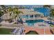 Inviting backyard with a private pool, spa, and tiki bar, ideal for entertaining at 5950 Bikini N Way, St Pete Beach, FL 33706