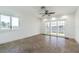 Bright room with tile flooring, ceiling fan, and sliding doors offer water views at 5950 Bikini N Way, St Pete Beach, FL 33706