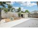 Backyard featuring fire pit, shed, and partial fence at 6220 Murdock Ave, Sarasota, FL 34231