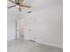 Bright bedroom featuring a ceiling fan and two closets, perfect for comfortable living at 6220 Murdock Ave, Sarasota, FL 34231