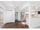 Open kitchen with stainless steel appliances and a breakfast bar at 6220 Murdock Ave, Sarasota, FL 34231